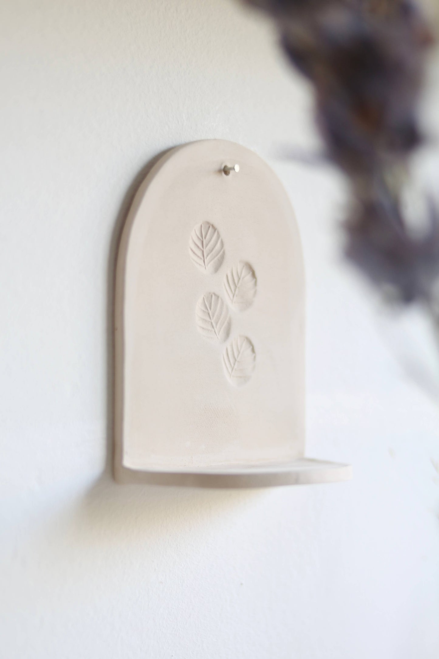 Ceramic wall hanger for candle light