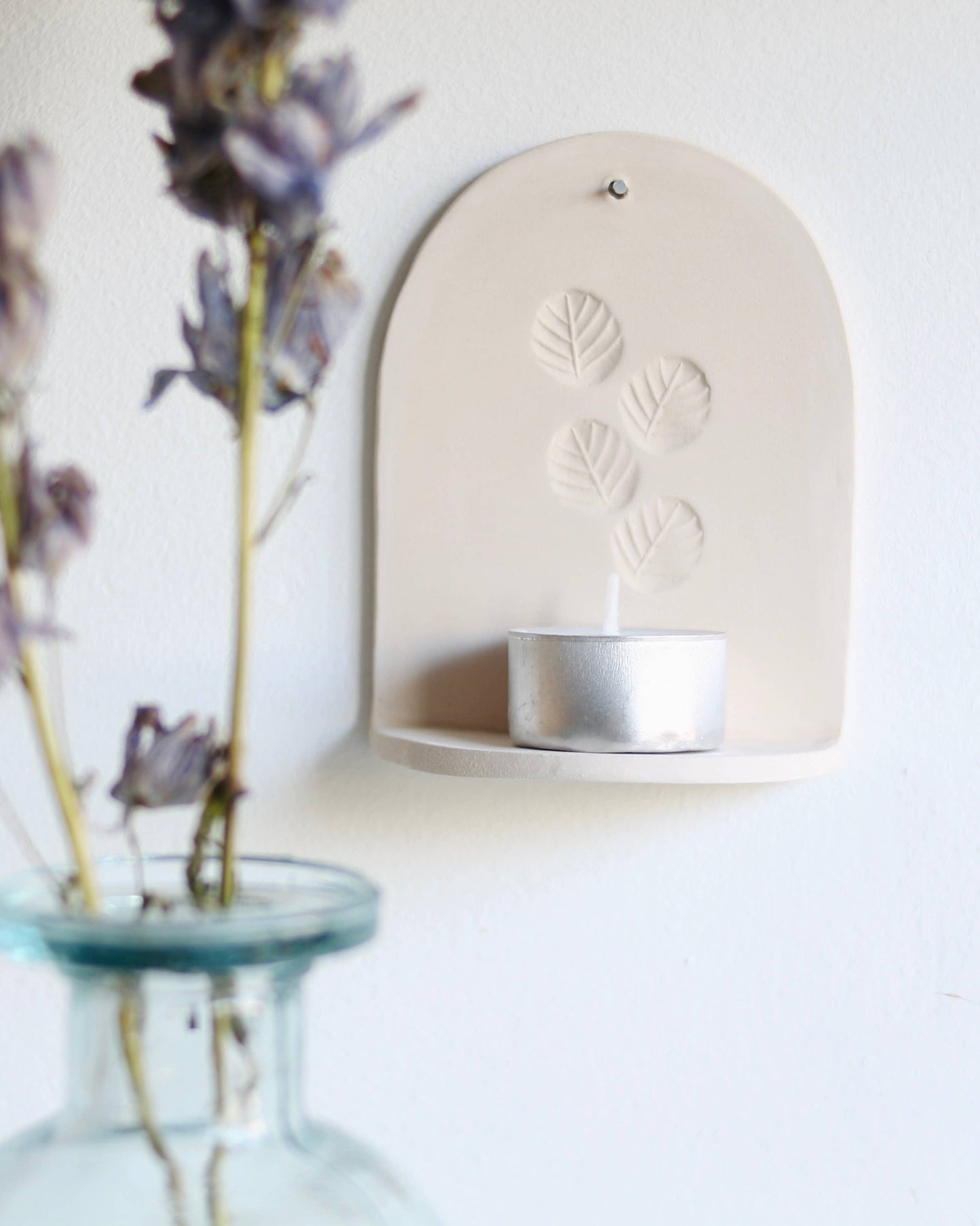 Ceramic wall hanger for candle light