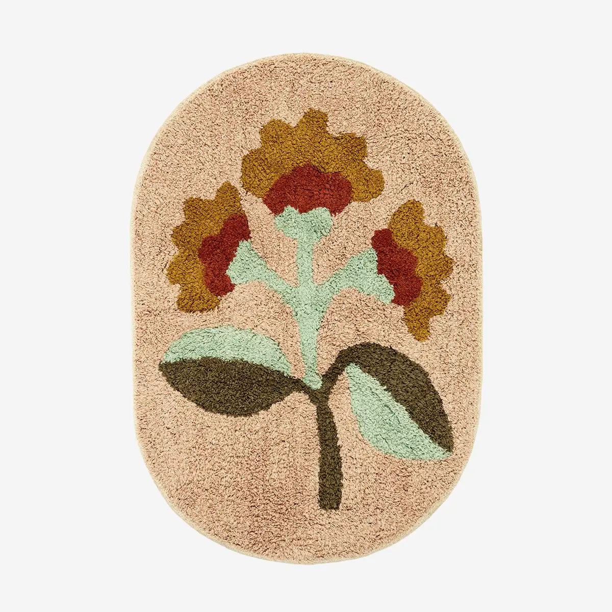 Oval tufted bath mat