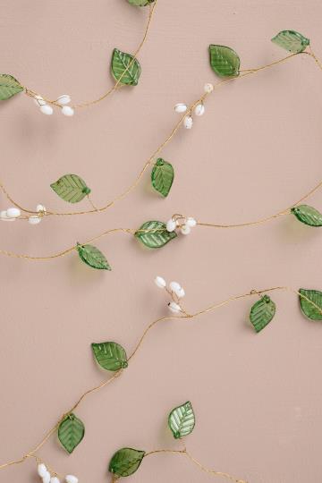 String w/green leaves Magic and Wishes