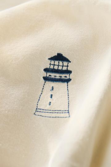 Napkin Atlantis w/blue lighthouse butter cream