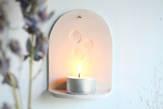 Ceramic wall hanger for candle light